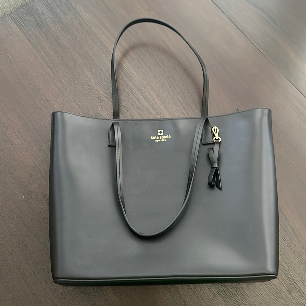 Kate Spade New York black leather zip top tote with ribbon accessory! NWOT.